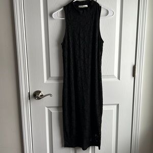 Black body fitted below the knee dress